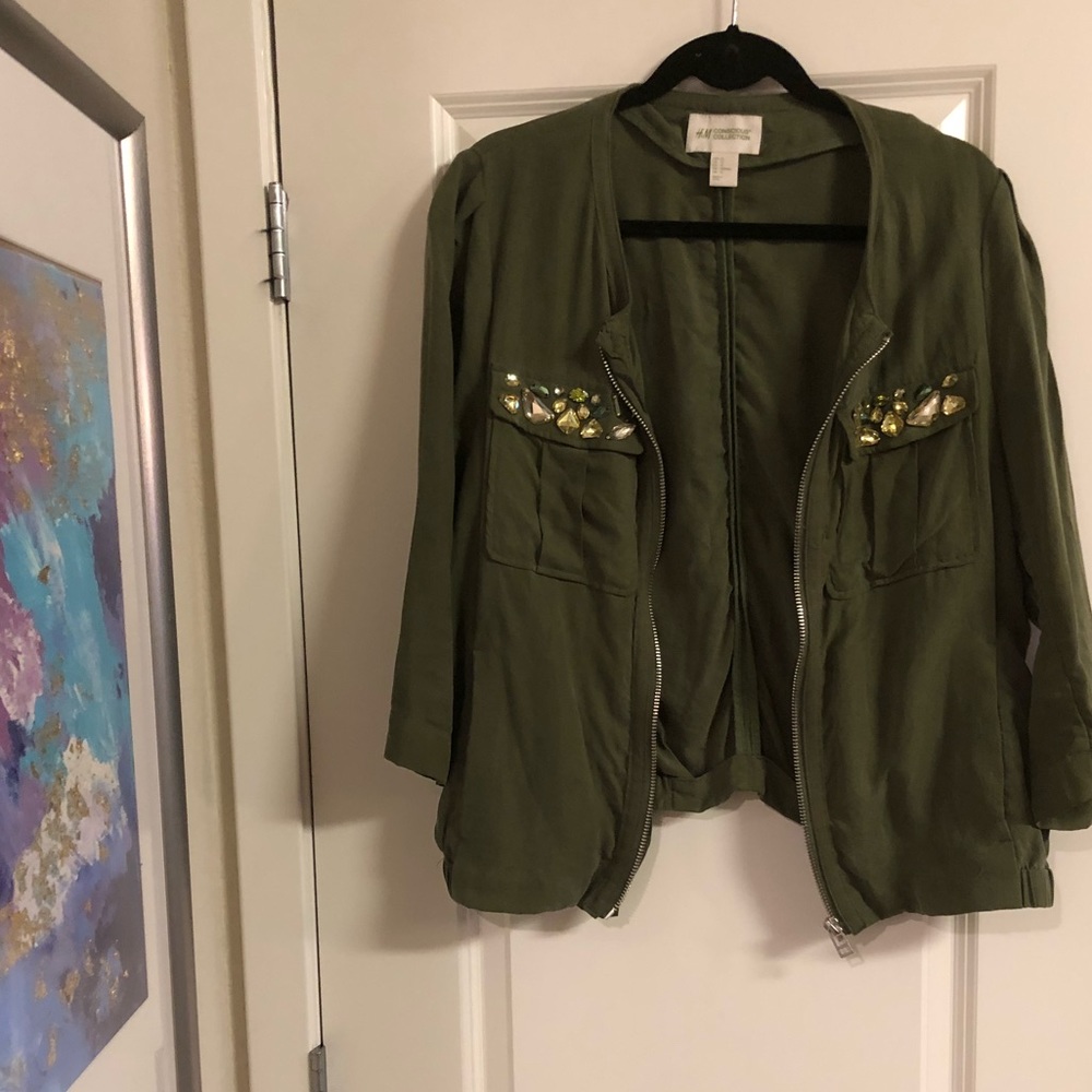 Light zip jacket with jeweled pocket detail